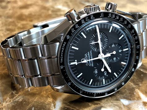 breitling omega speedmaster